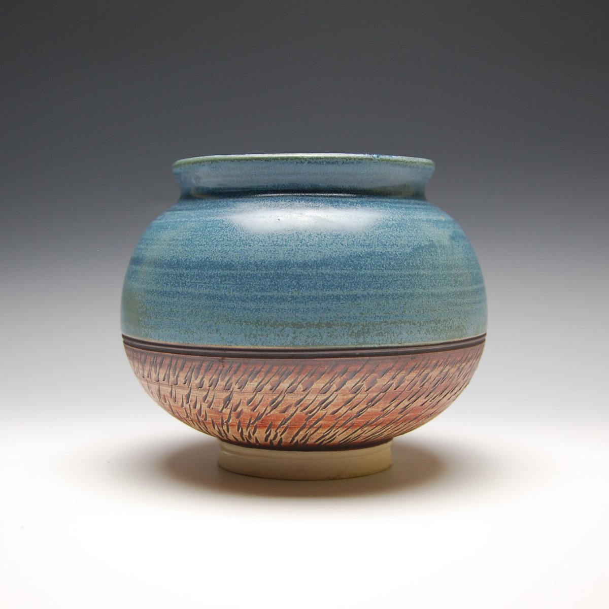 Medium blue vase with chattering texture